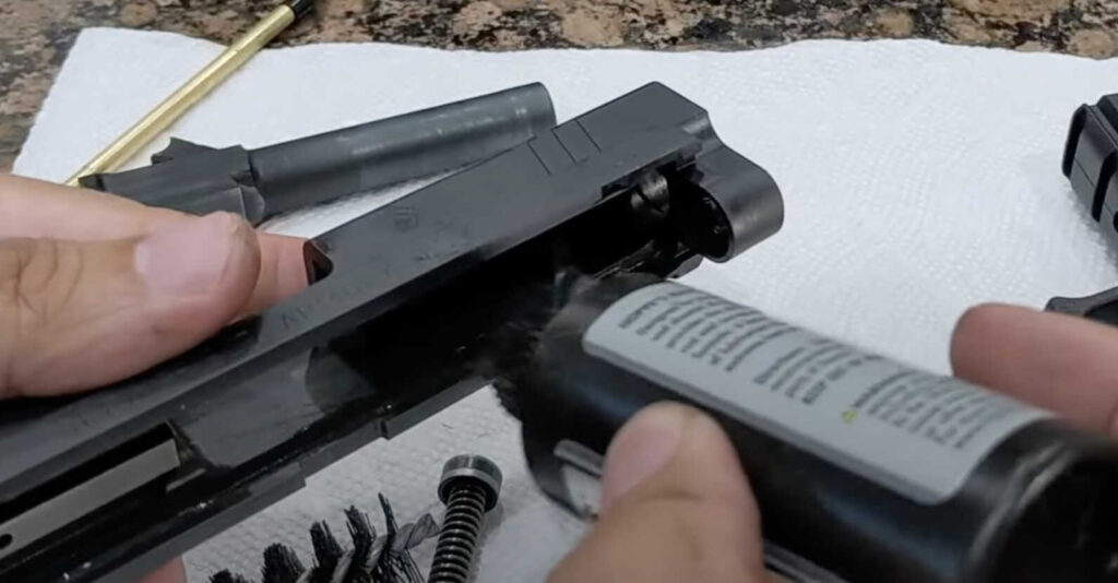 Apply oil to the Springfield XD slide rails