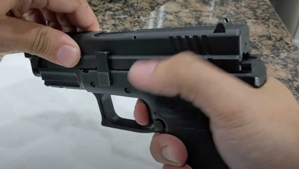 Pull the trigger on the Springfield XD to release the striker