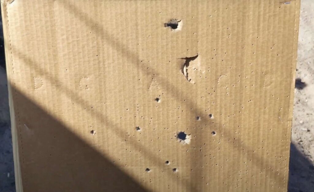 Shot pattern with default choke, 1 bird shot, 1 buck shot, and 2 slugs, at 25 yards